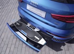 Audi Q3 with longboard