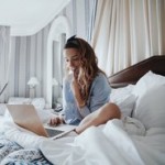 Social influencer La Revue De Kenza lounges in her Parisian hotel room