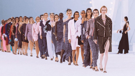 Models wear creations for the Chanel Spring-Summer 2022 ready-to-wear  fashion show presented in Paris, Tuesday, Oct. 5, 2021. (Photo by Vianney  Le Caer/Invision/AP Stock Photo - Alamy